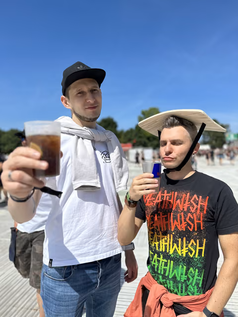 Two teammates enjoying a sunny outdoor break