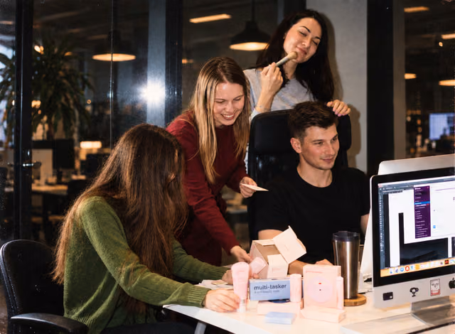 Colleagues reviewing a design together
