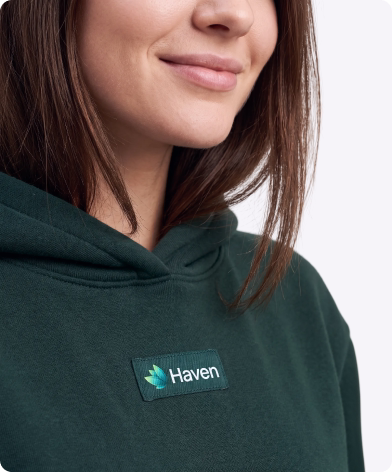 Haven branded hoodie with an embroidered logo patch designed by Halo Lab