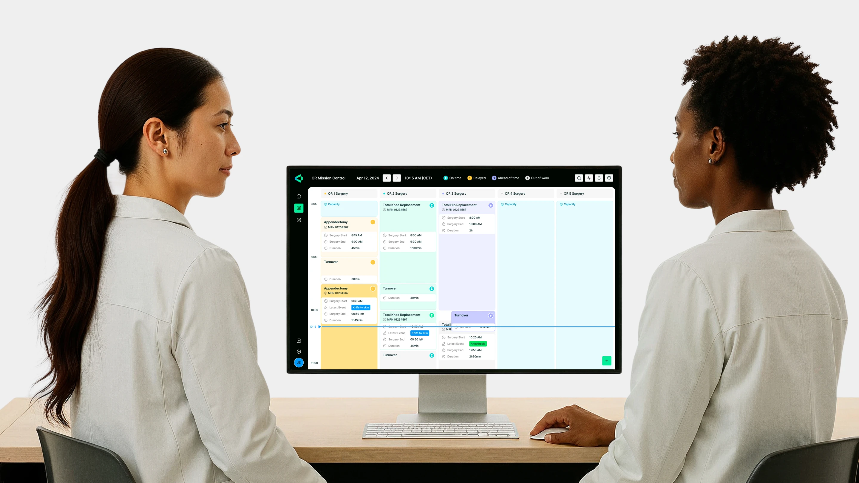 Clinicians reviewing VitVio’s operating room scheduling dashboard designed by Halo Lab