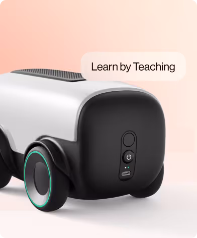 Bella learning robot close-up with a Learn by Teaching label