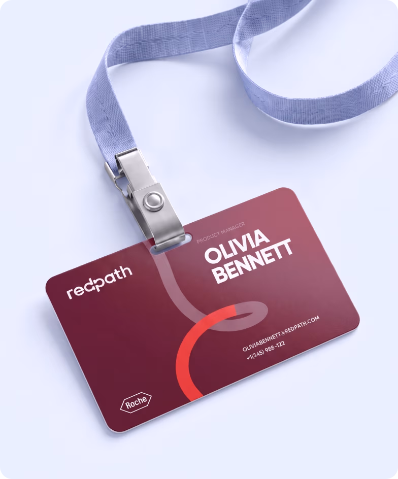 RedPath staff badge on a lanyard with the Roche logo