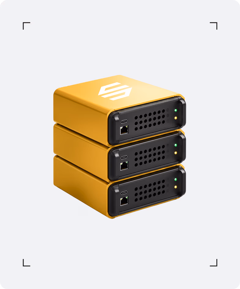 Stack of yellow SMAVOO IoT gateway devices