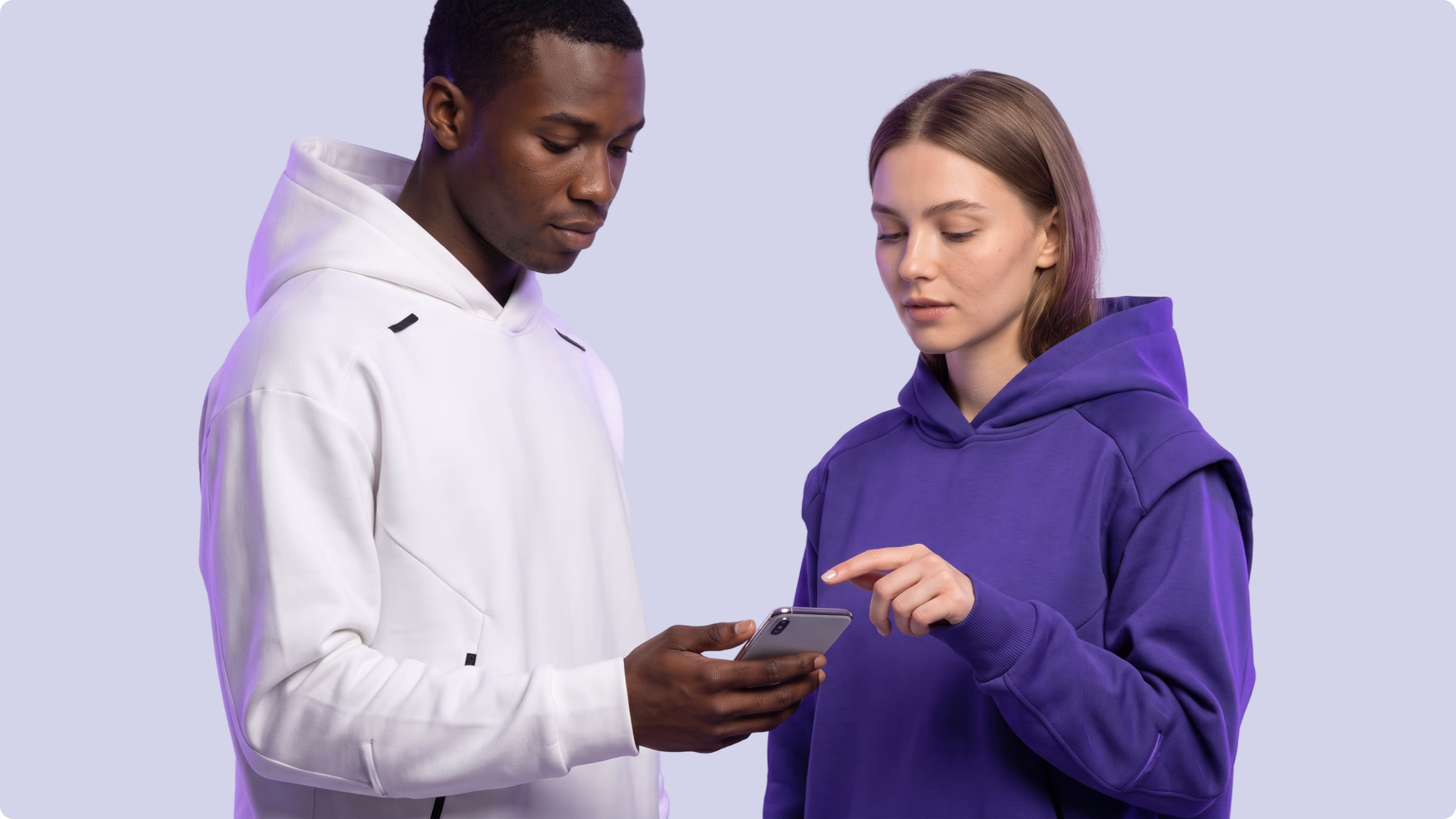 Two people reviewing the Chainstarters platform on a smartphone