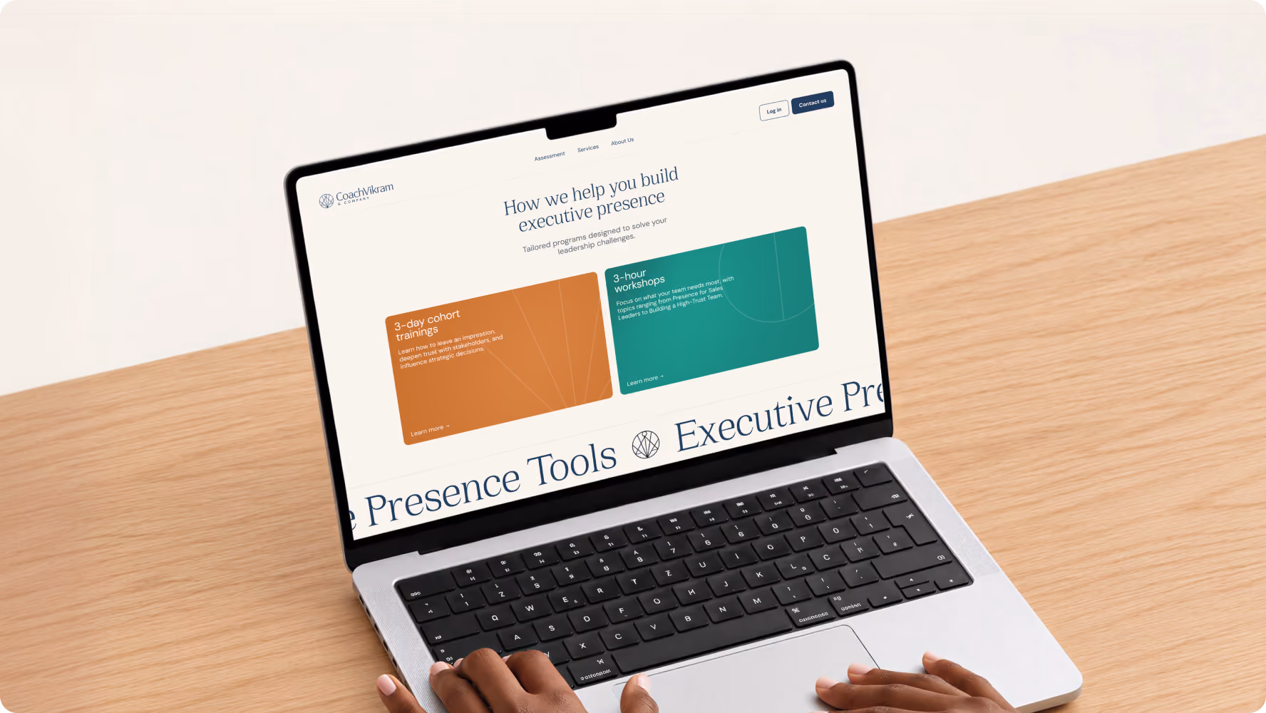 CoachVikram & Company website UI design on a laptop
